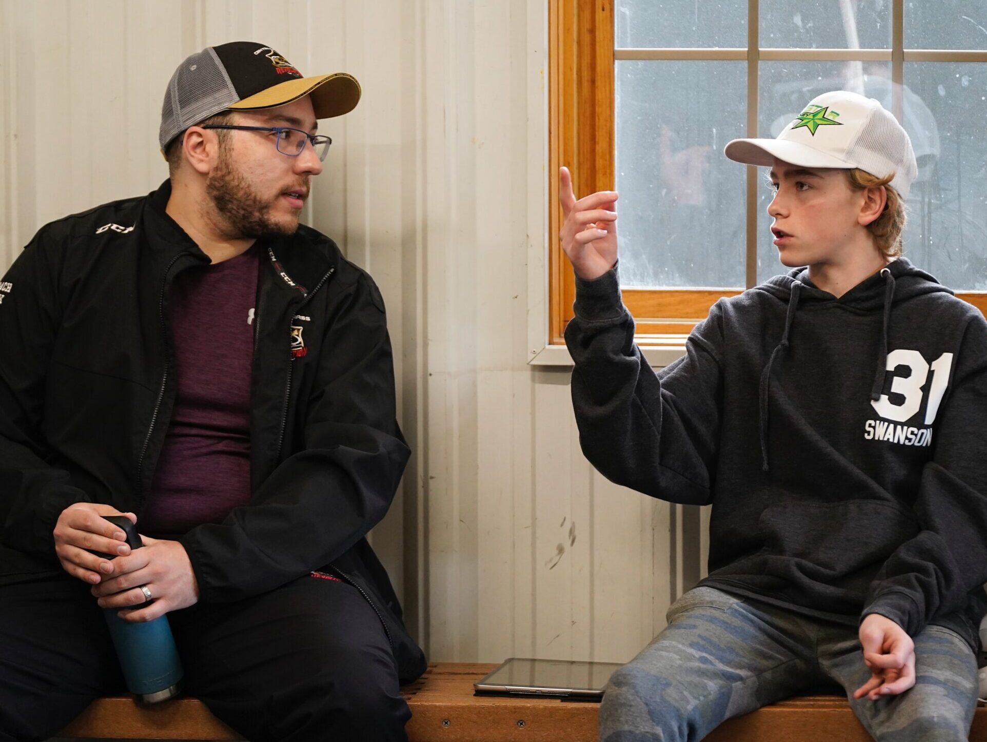 Two people engaged in conversation.